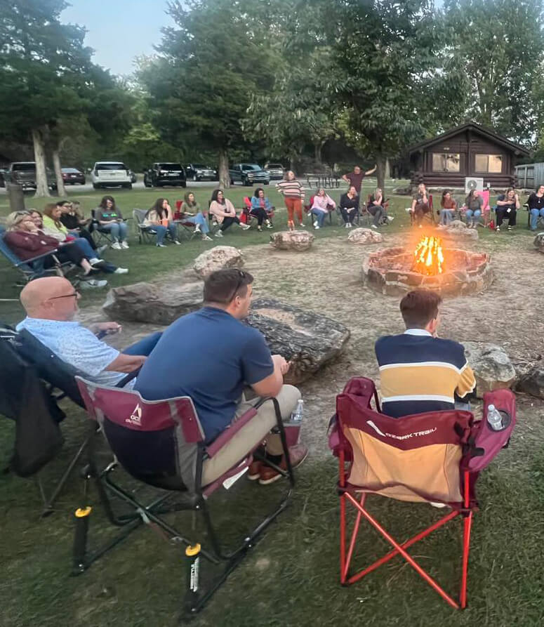 The Leadership Paragould group around a campfire at Crowley's Ridge State Park.