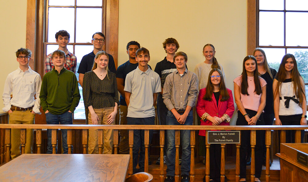 Young Professionals taking their group photo in the Chamber Office.