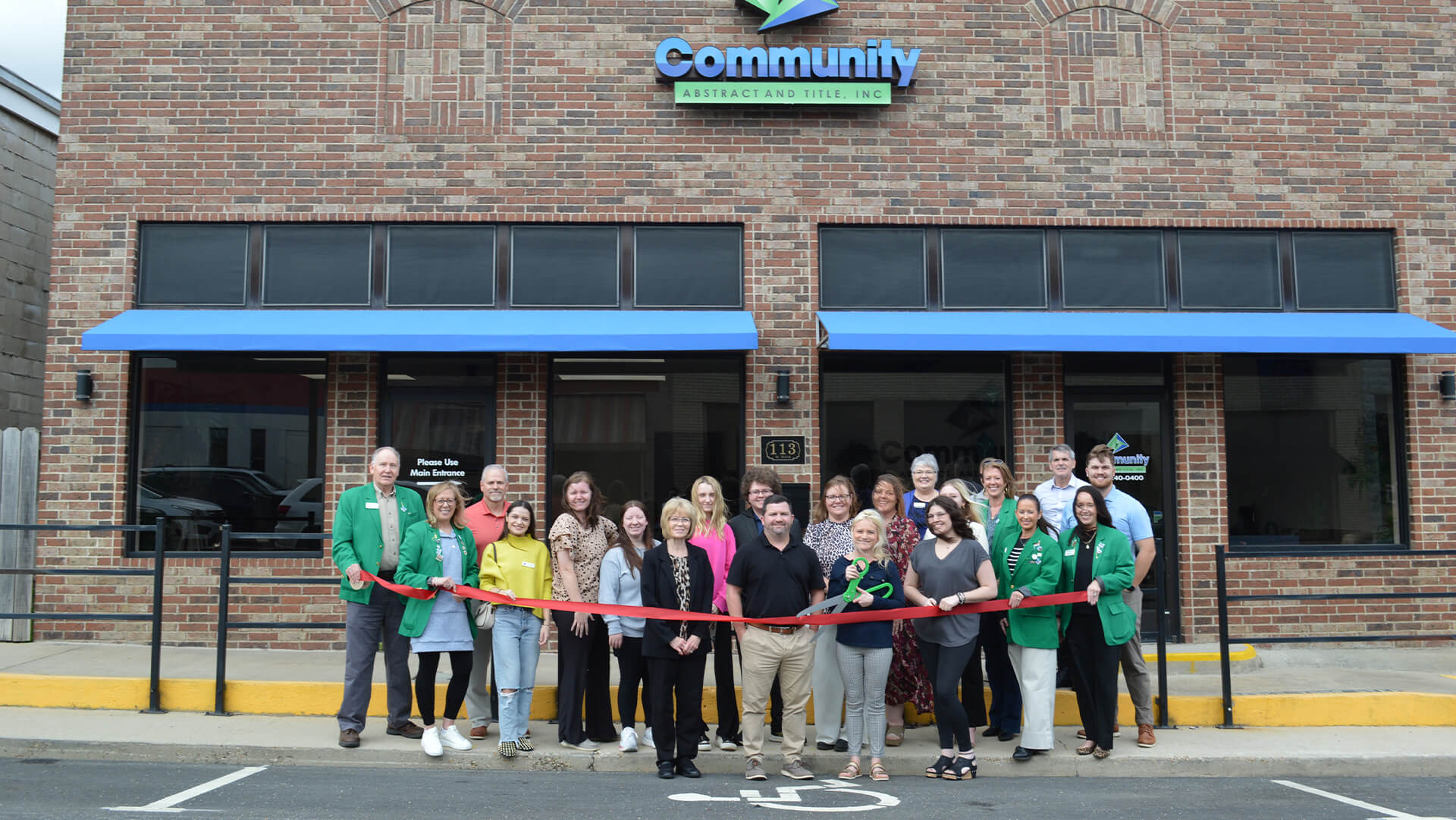 Ribbon cutting ceremony at Community Abstract and Title, Inc.