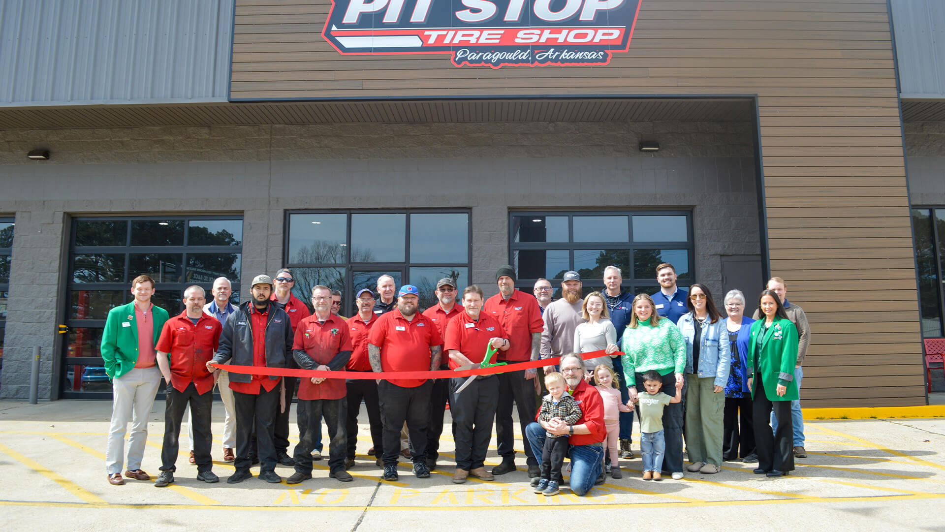 Ribbon cutting ceremony at Pit Stop Tire Shop.
