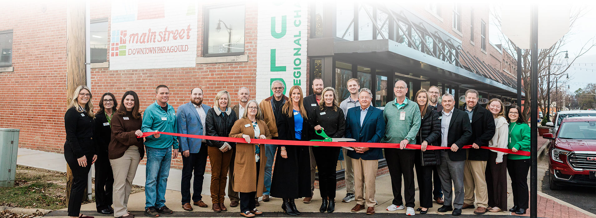 Ribbon Cutting outside the new Paragould Chamber of Commerce Office
